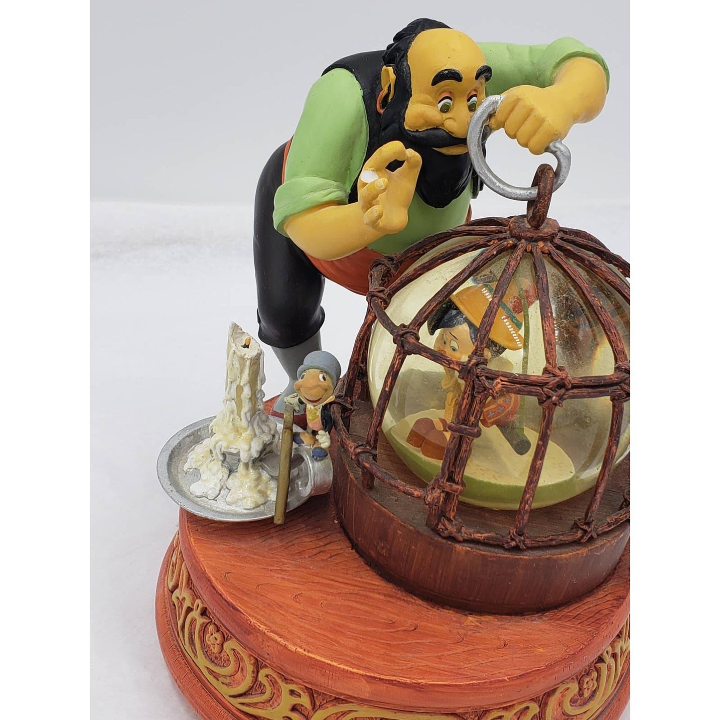 Walt Disney Snow Globe Pinocchio Stromboli Jiminy Cricket Music Box Tune Toyland