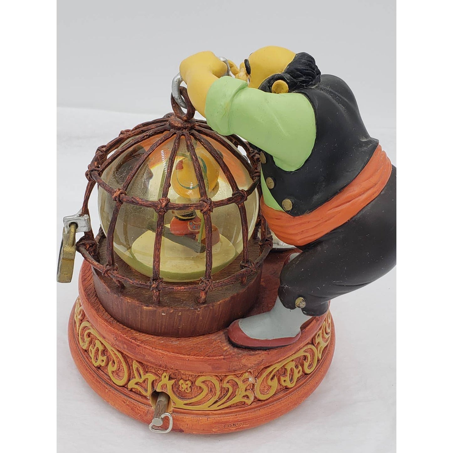 Walt Disney Snow Globe Pinocchio Stromboli Jiminy Cricket Music Box Tune Toyland