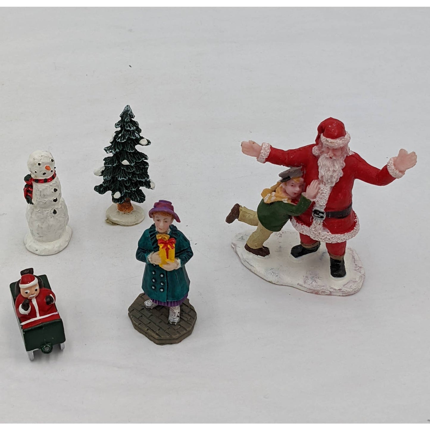 Lemax Christmas Figurines Hugging Santa Claus Tree