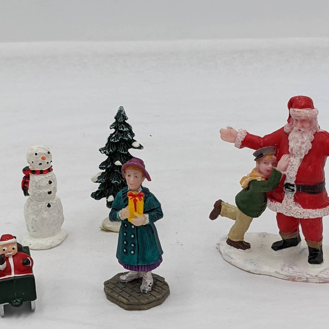 Lemax Christmas Figurines Hugging Santa Claus Tree