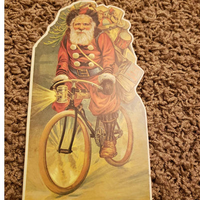 Vintage 1985 Merrimack Santa Bicycle Christmas Die Cut Hanging Card Ornament