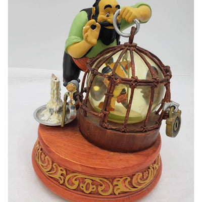 Walt Disney Snow Globe Pinocchio Stromboli Jiminy Cricket Music Box Tune Toyland