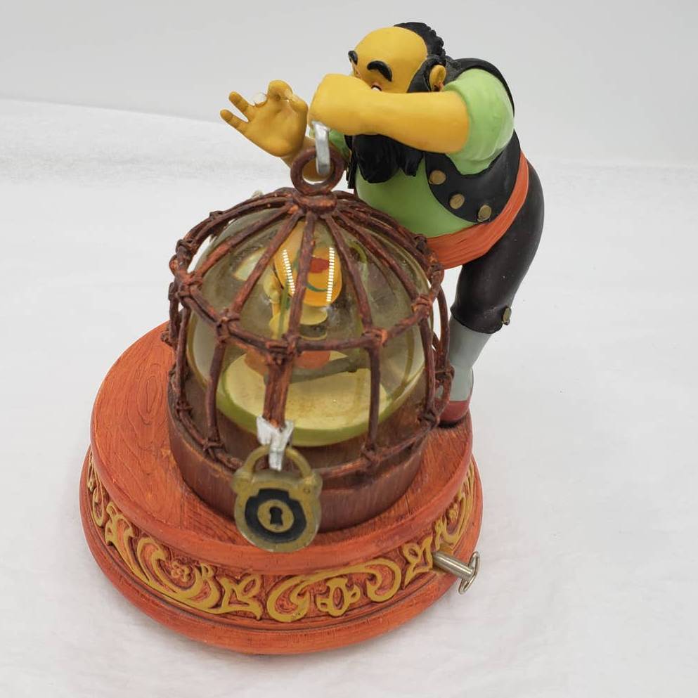 Walt Disney Snow Globe Pinocchio Stromboli Jiminy Cricket Music Box Tune Toyland