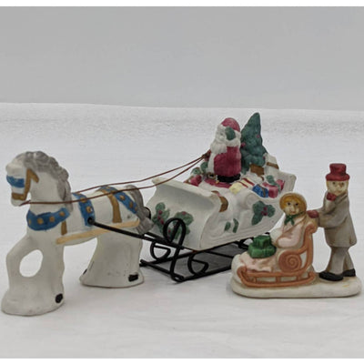 Set of 2 Christmas Figurines Waving Santa Present Carriage Horse