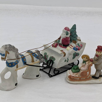 Set of 2 Christmas Figurines Waving Santa Present Carriage Horse